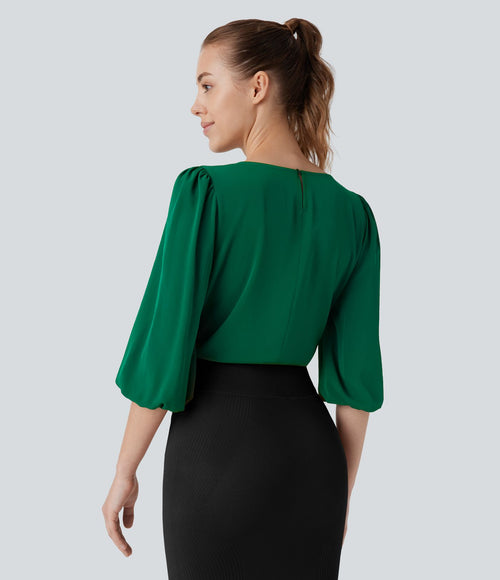 Blouse de travail col bateau avec manches évêque et dos ajouré