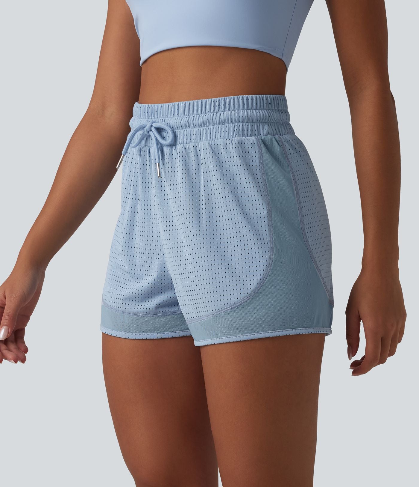 Short de sport 2 en 1 taille haute, cordon de serrage et œillets, en maille respirante