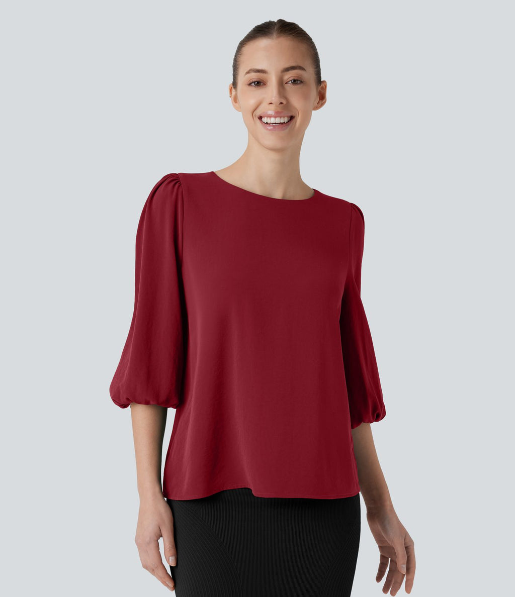 Blouse de travail col bateau avec manches évêque et dos ajouré