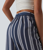 Pantalon large taille haute à rayures avec ceinture et poches