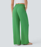 Pantalon large fluide taille haute avec cordon de serrage, poches latérales et aspect lin