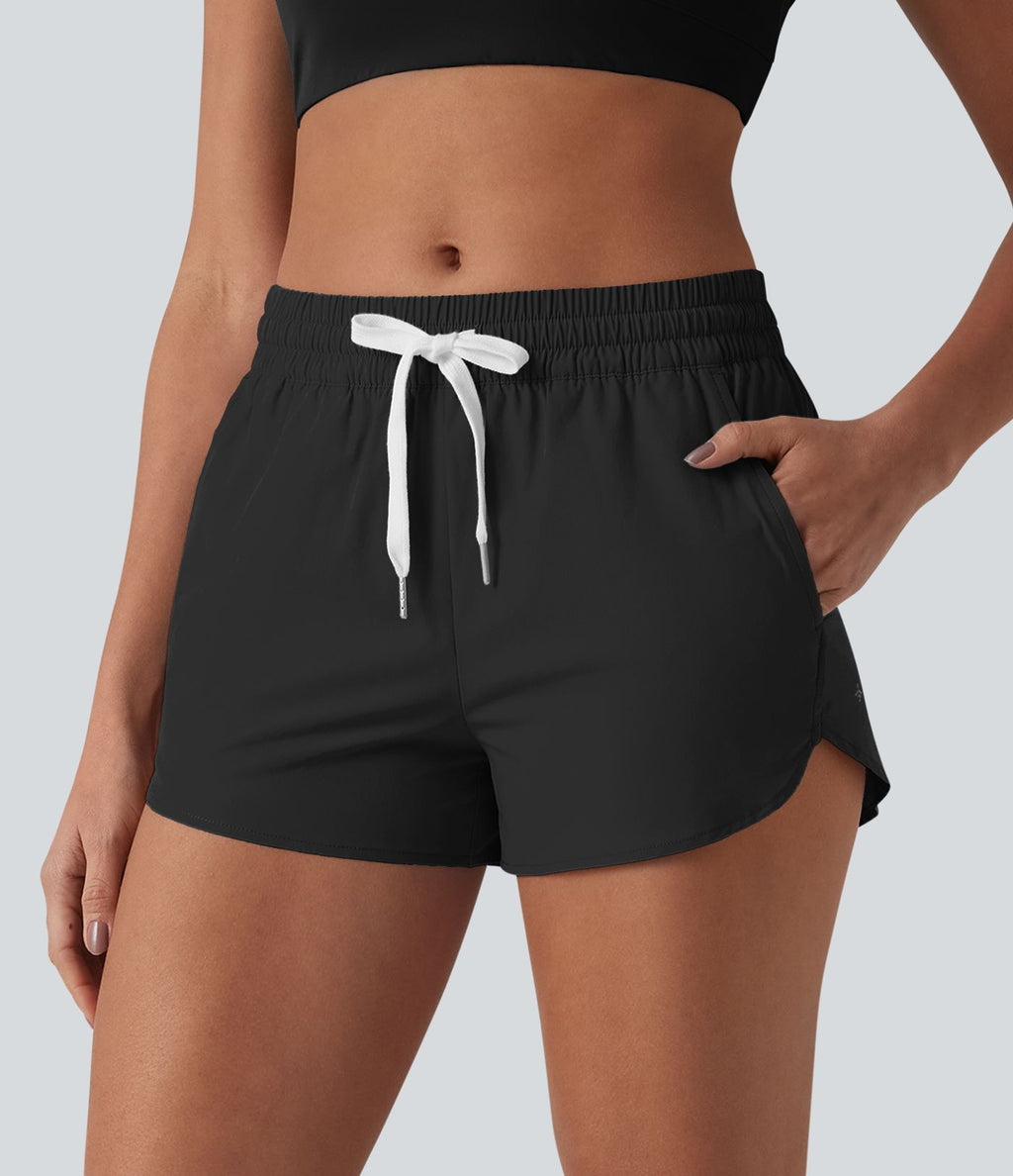 Breezeful™ Short de course taille mi-haute à séchage rapide, cordon de serrage, ourlet arrondi, sous-short intégré et poches
