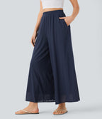 Pantalon fluide et ample avec superposition en mesh, poches latérales et taille haute