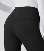 Pantalon tailleur skinny gainant taille haute à chevrons avec poches arrière zippées décoratives