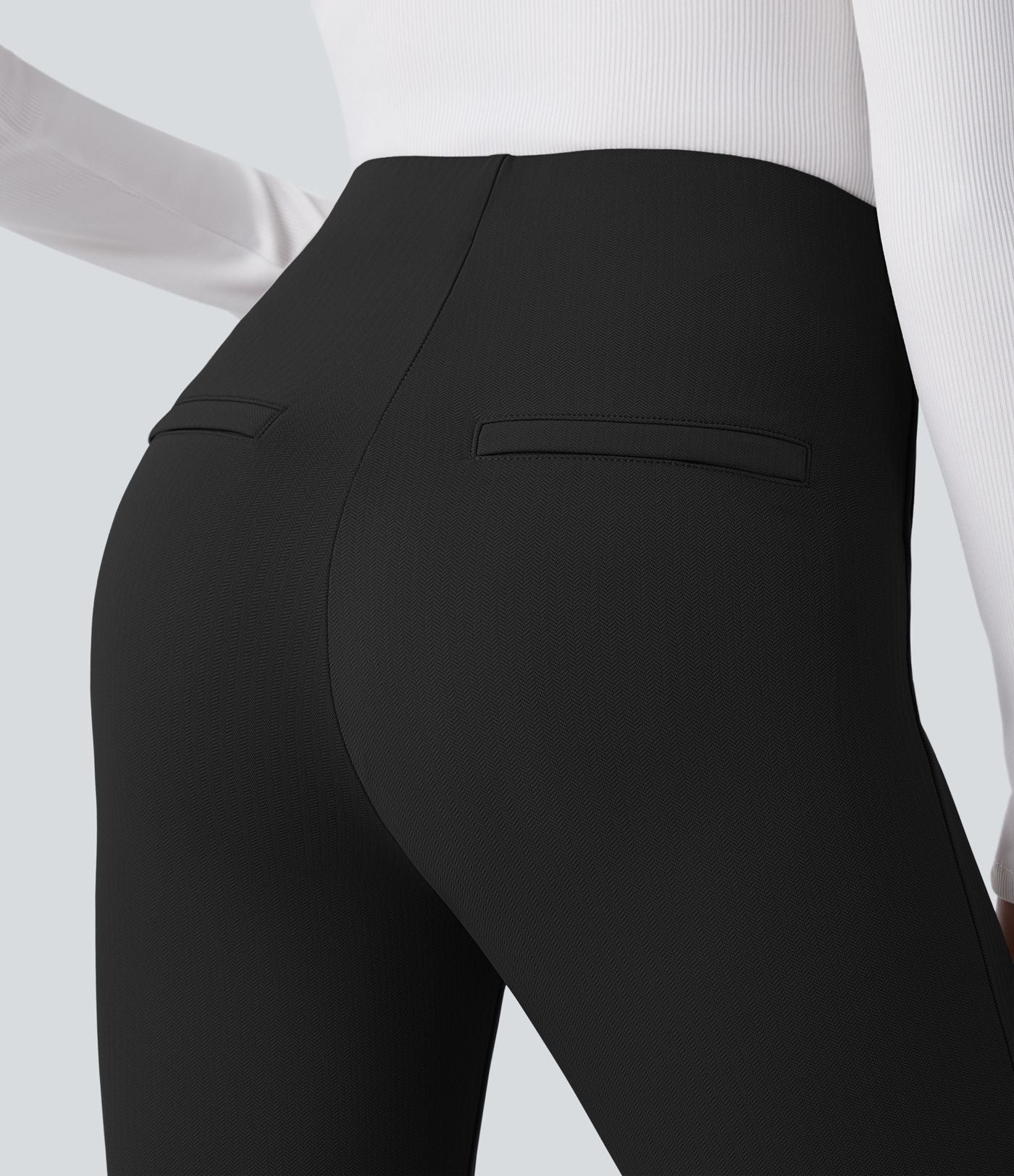 Pantalon tailleur skinny gainant taille haute à chevrons avec poches arrière zippées décoratives