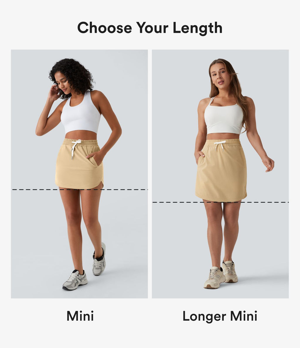 Jupe-short golf mini 2-en-1 taille haute à cordon de serrage et ourlet arrondi avec poches - Longueur plus longue