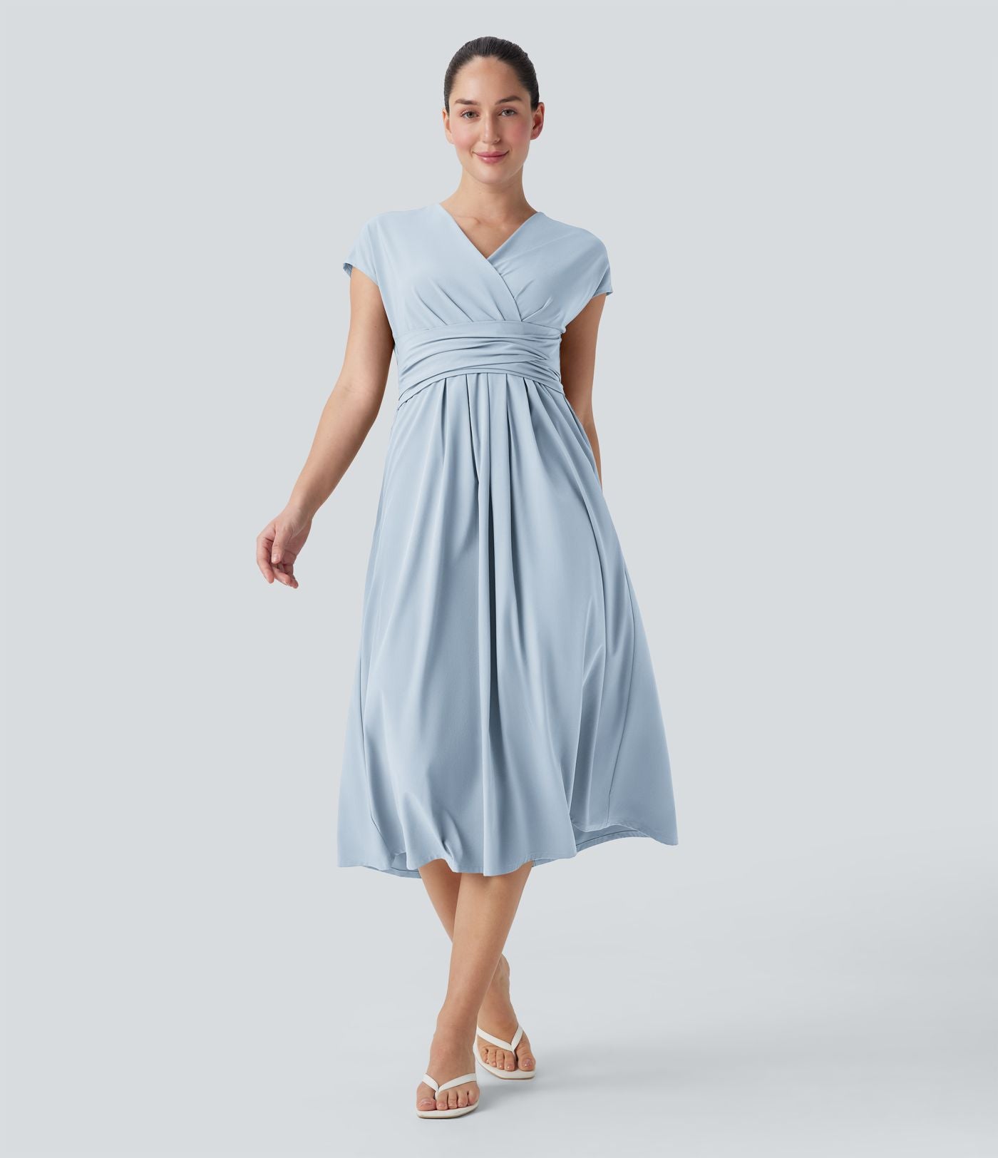 Robe midi Breezeful™ col V manches courtes à liens dans le dos séchage rapide avec poches latérales