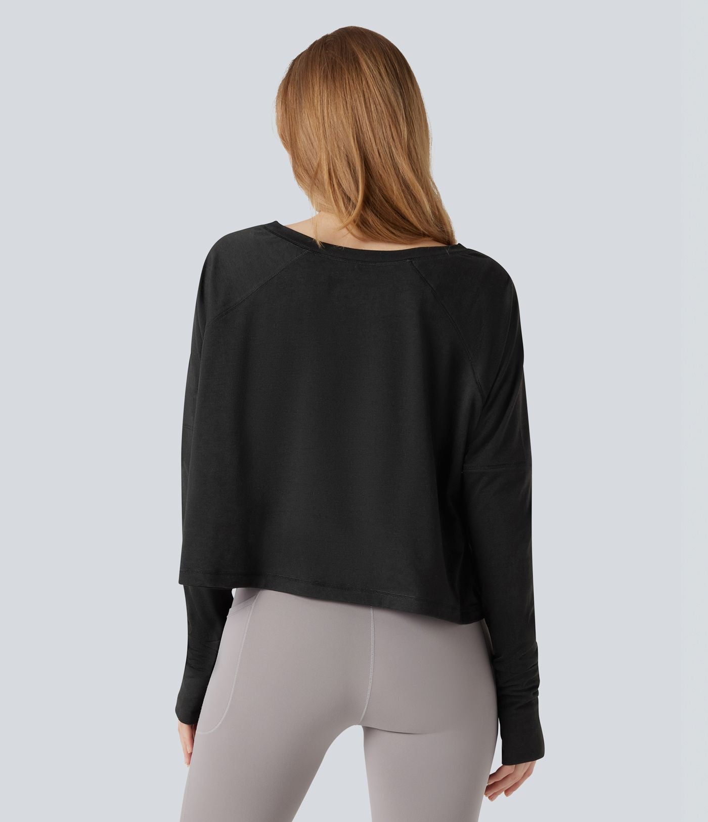 Top de sport running asymétrique col rond coupe décontractée manches longues avec trous pouces