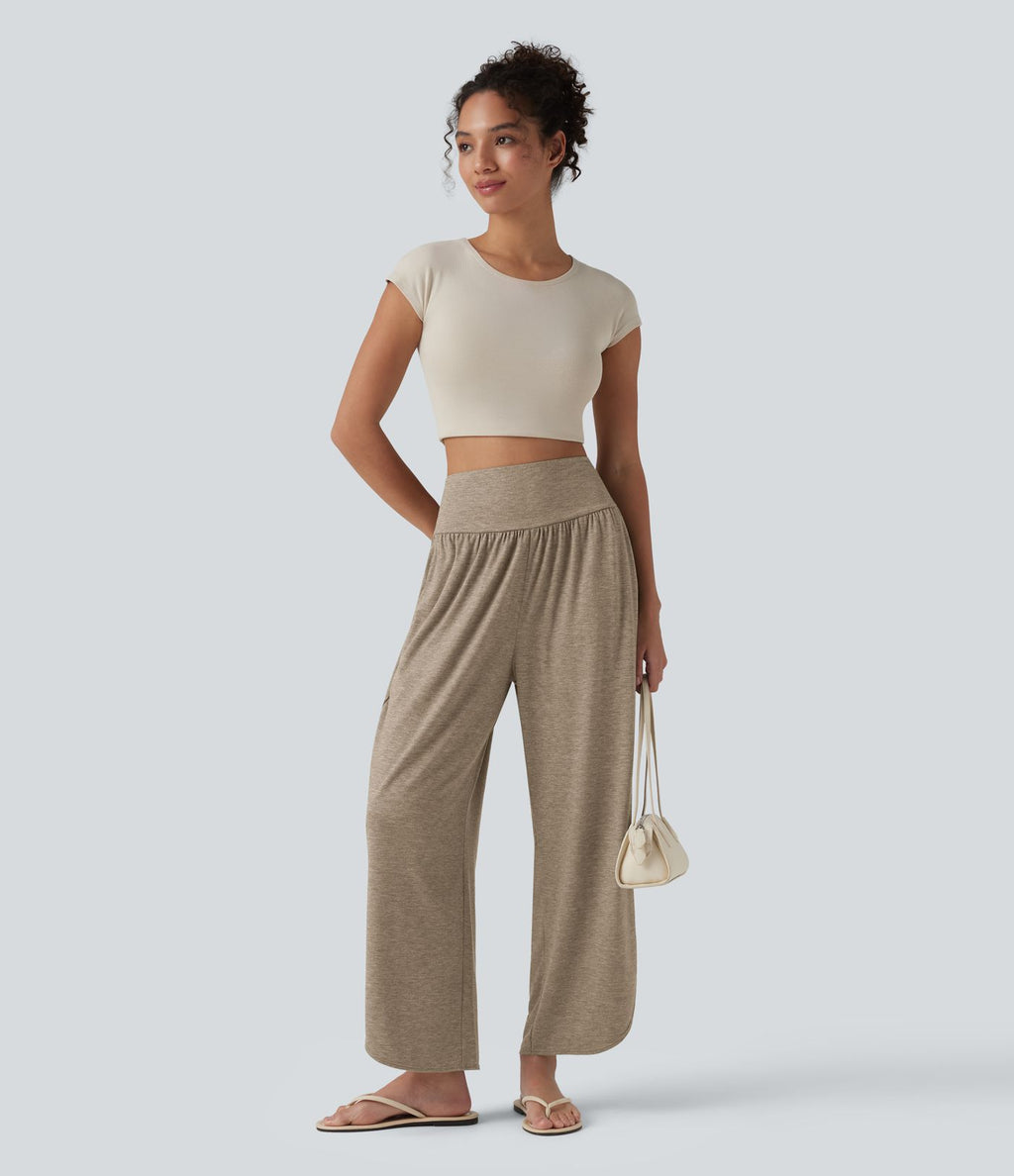 Pantalon décontracté taille haute gainant avec ourlet arrondi et poches