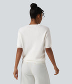Pull col rond manches courtes en tissu gaufré