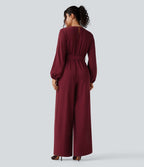 Combinaison pantalon de soirée large à décolleté en V, manches longues bouffantes, ceinture et poches