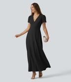 Robe mariage maxi fluide col V à manches courtes, dos nu avec lien noué et brassière intégrée