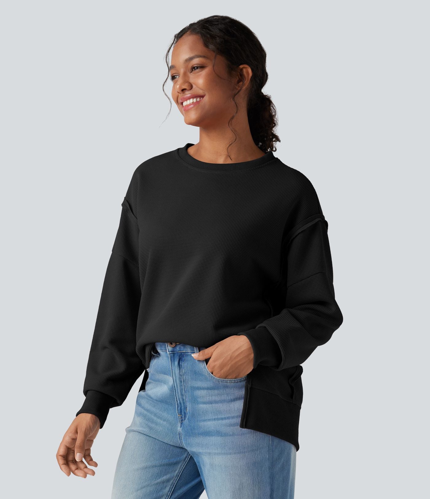 Sweat-shirt gaufré col rond ourlet fendu manches longues