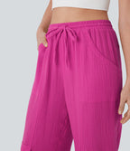 Pantalon cargo large fluide en coton taille haute avec cordon de serrage et poches