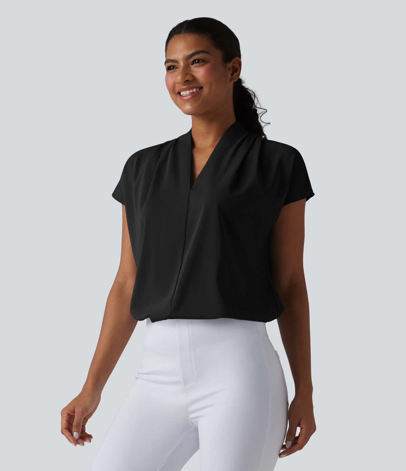Blouse esprit bureau ample défroissage facile, col V et manches chauve-souris