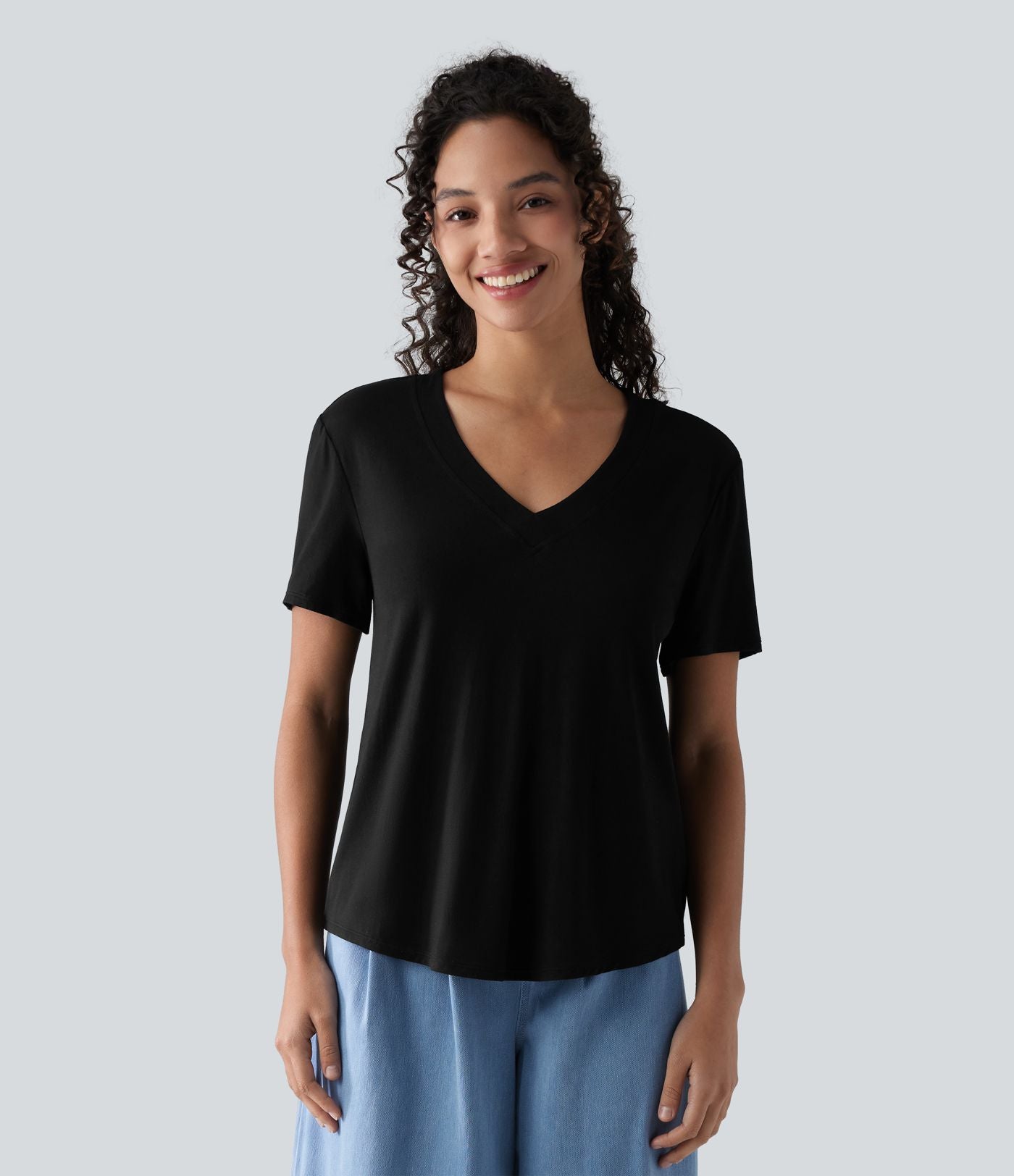 T-shirt décontracté col V manches courtes ourlet arrondi