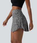 Jupe-short de tennis mini taille haute croisée imprimé léopard avec poches