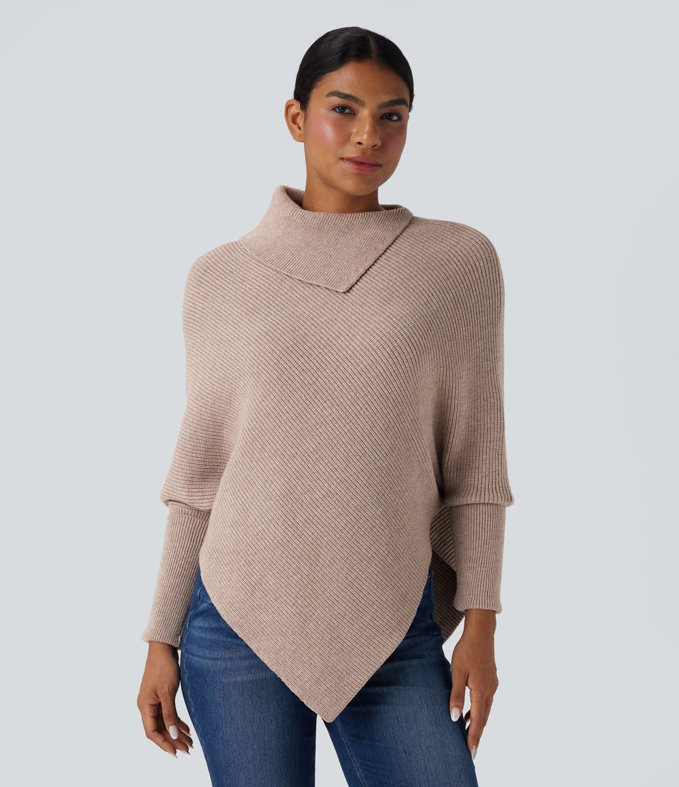 Pull cape décontracté col roulé manches chauve-souris ourlet asymétrique