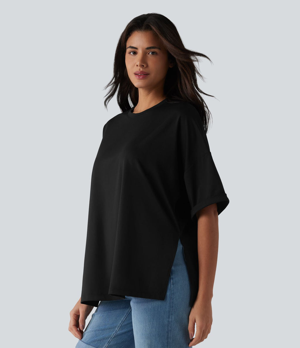 T-shirt décontracté col rond manches retroussées avec ourlet fendu