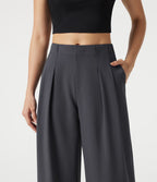 Pantalon casual ample toucher lin taille mi-haute à poches