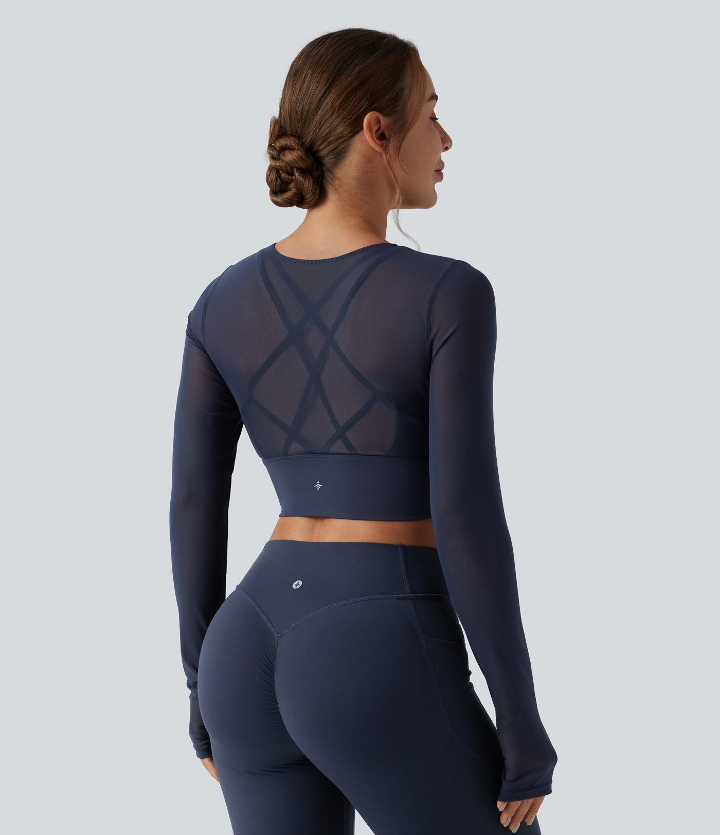 Haut de sport yoga cropped 2-en-1 manches longues mesh contrastant à trous pouces