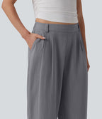 Pantalon décontracté coupe ballon taille mi-haute aspect lin avec poches