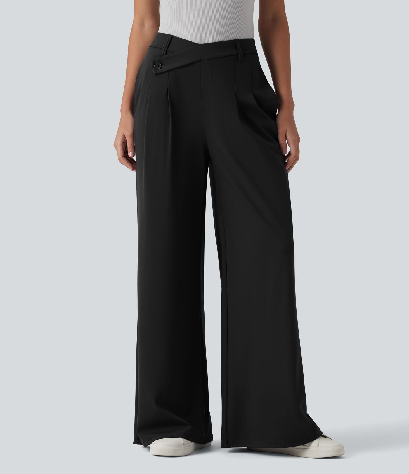 Pantalon tailleur évasé asymétrique taille mi-haute avec poches