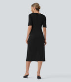 Robe tailleur décolleté arrondi manches courtes avec fente
