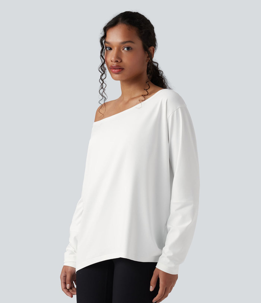 Haut de yoga ample asymétrique à manche longue
