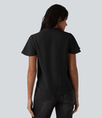 Blouse casual col V à manches volantées et ourlet arrondi