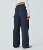 Pantalon décontracté droit taille moyenne à bouton, fermeture éclair et poches latérales