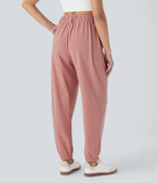 Pantalon de jogging décontracté taille haute fuselé en tissu gaufré avec poche latérale