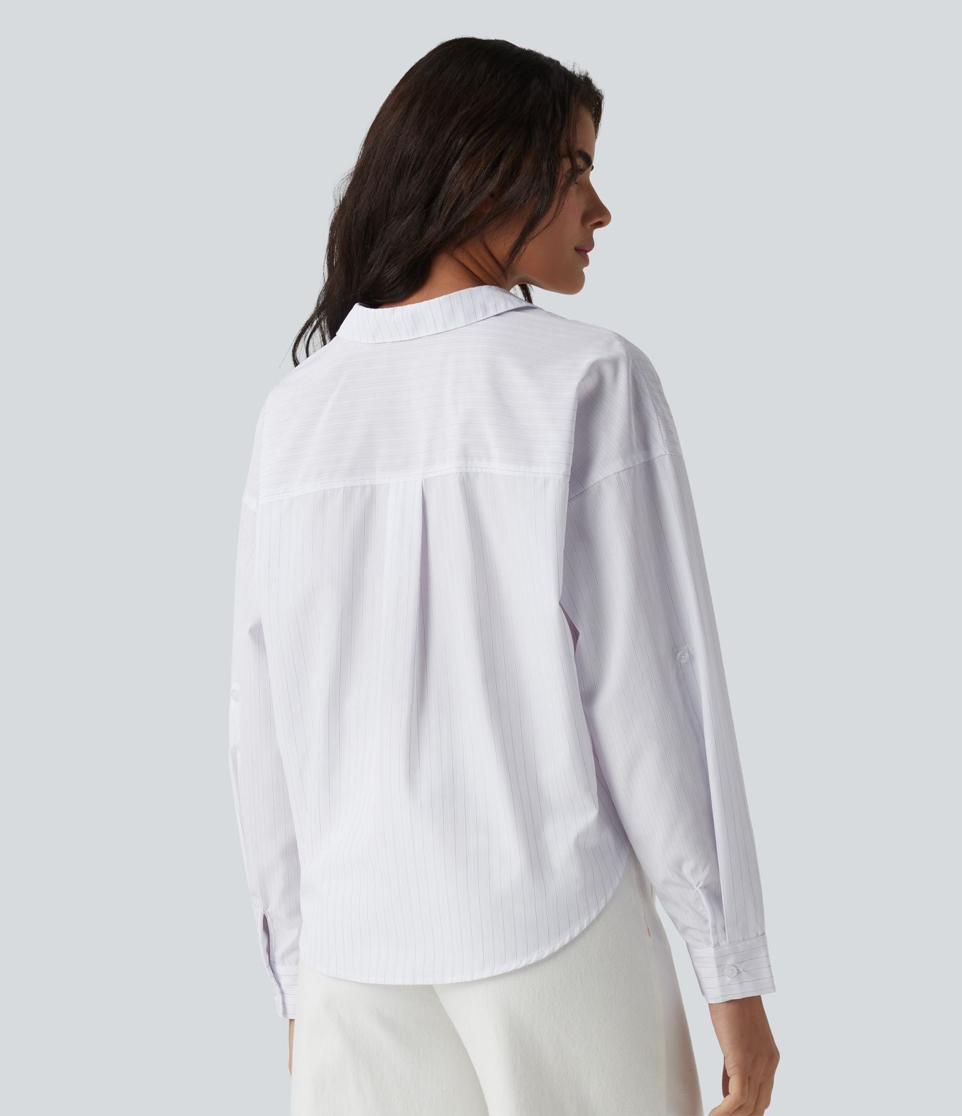 Chemise casual col manches retroussées torsadée asymétrique à rayures