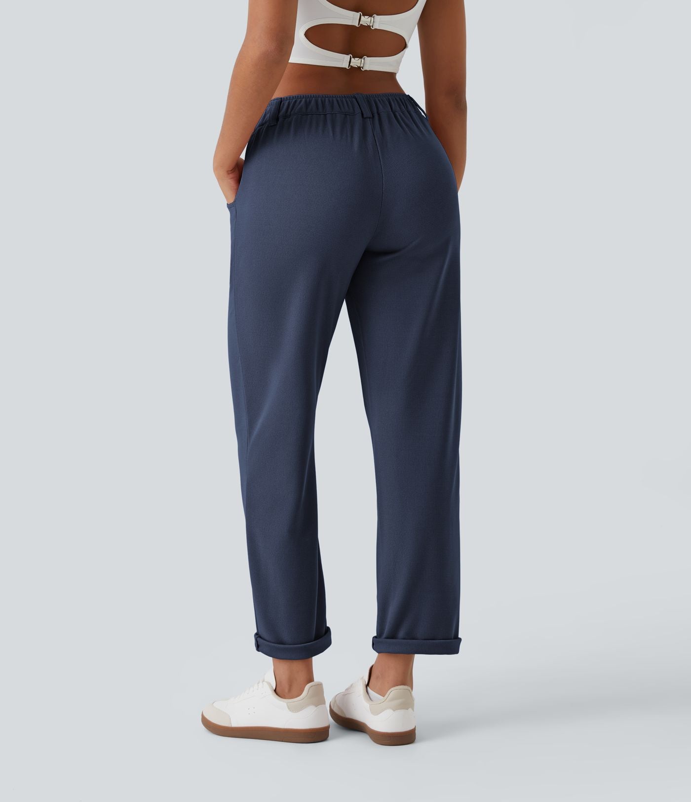 Pantalon casual taille mi-haute en maille gaufrée avec poche zippée