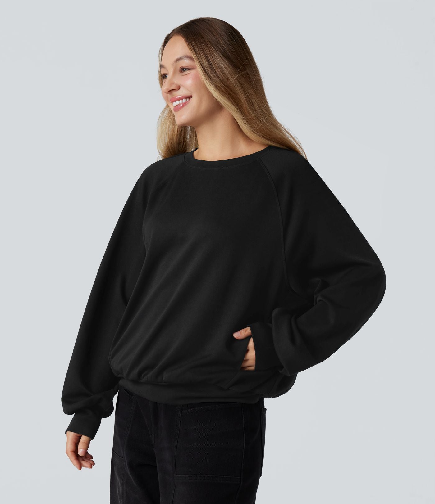 Sweat-shirt col rond manches longues à découpes avec poches