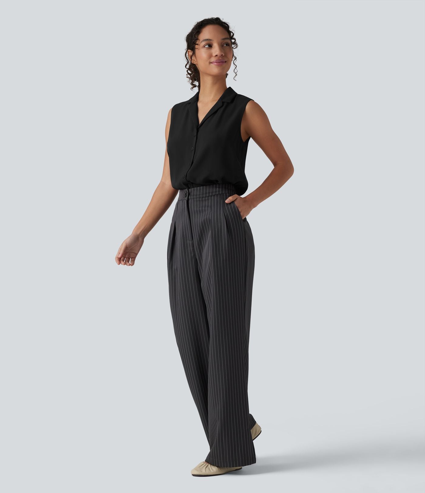 Blouse tailleur ample col revers sans manches à boutonnière