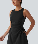 Robe tailleur mini sans manches à col rond froncée avec poches
