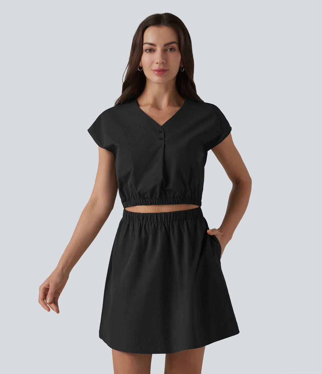 Robe col V manches courtes à découpes en popeline extensible avec poches
