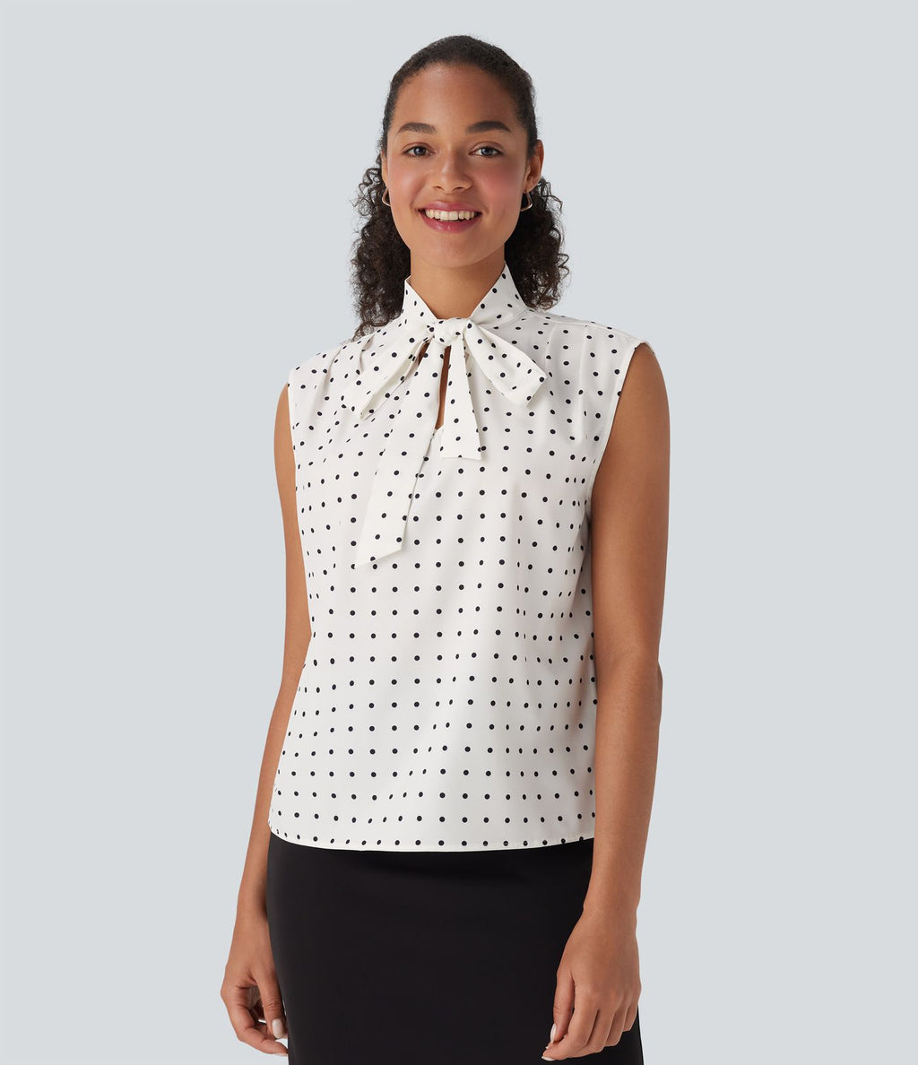 Chemise de travail sans manches à pois avec nœud devant