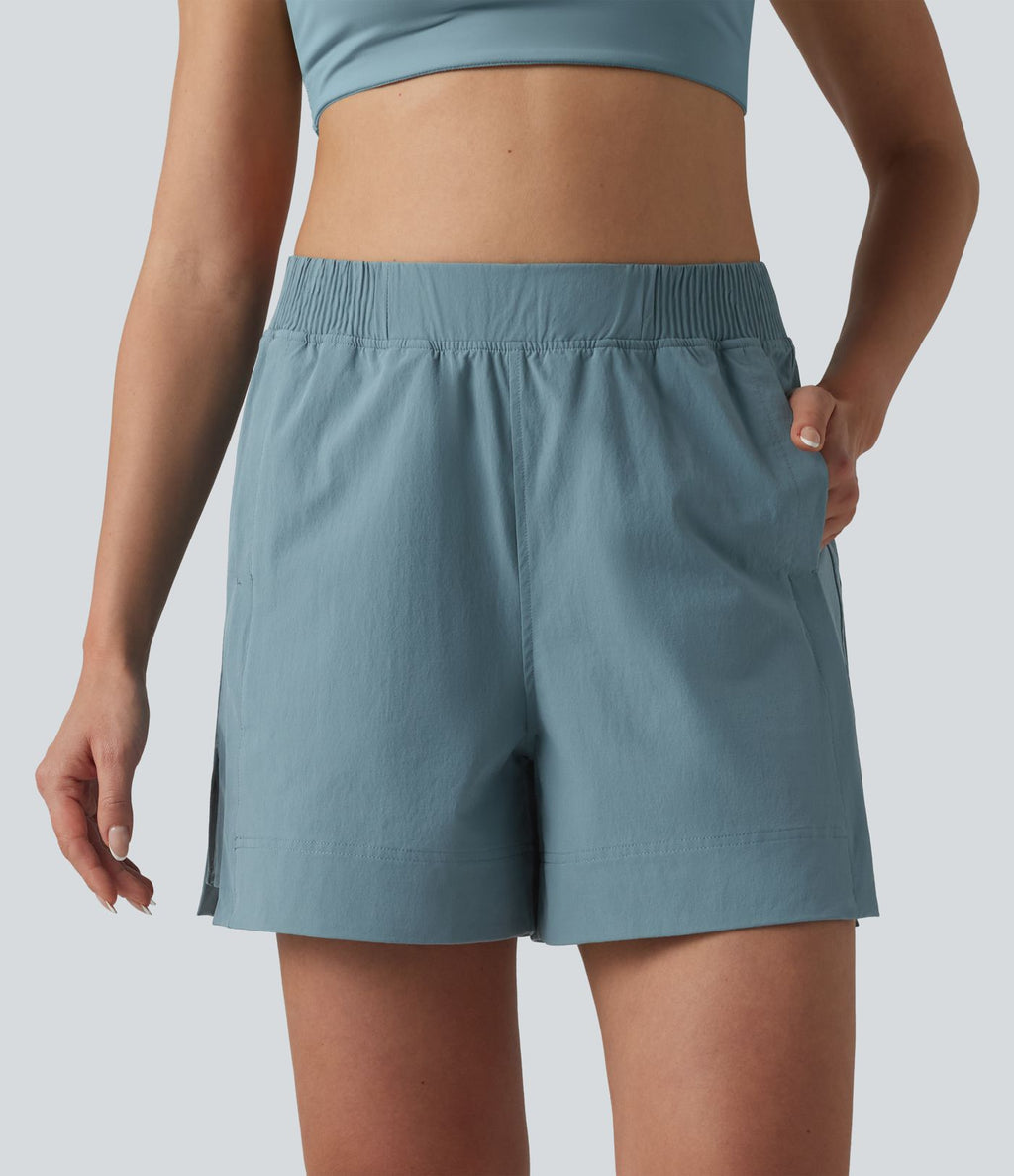Short de tennis taille haute effet frais InstantCool avec fentes et poches, protection solaire UPF50+
