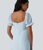 Robe de demoiselle d'honneur et d'invitée de mariage en mousseline fendue col Reine Anne manches bouffantes longueur midi