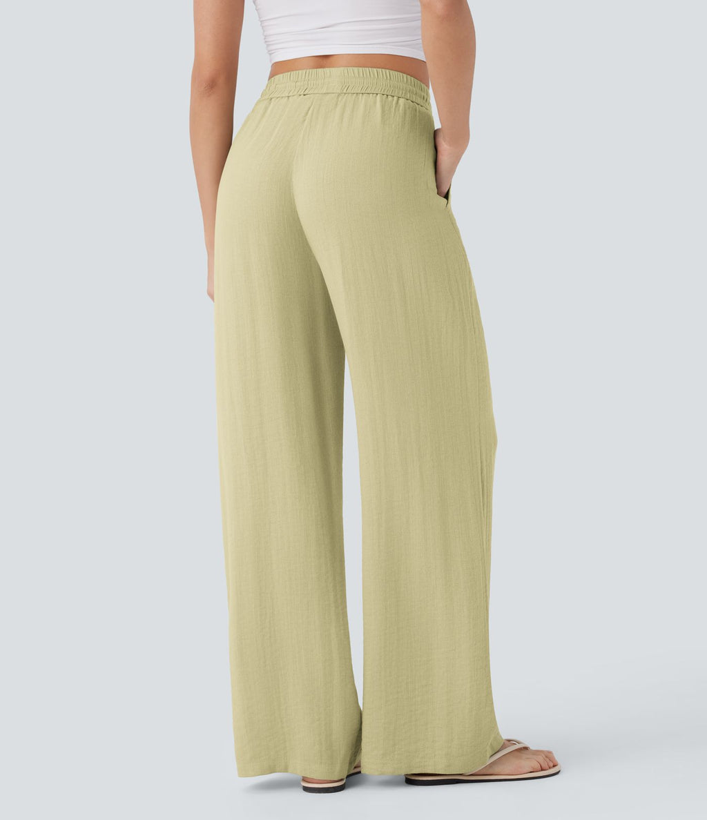 Pantalon large fluide taille haute avec cordon de serrage, poches latérales et aspect lin