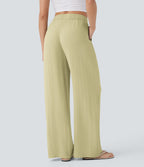 Pantalon large fluide taille haute avec cordon de serrage, poches latérales et aspect lin