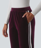 Pantalon évasé en velours taille basse color block à rayures avec poches