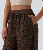 Pantalon casual large gaufré imprimé léopard taille haute avec cordon de serrage et poches