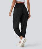 Pantalon de yoga croisé taille haute à séchage rapide Breezeful™ avec poches latérales