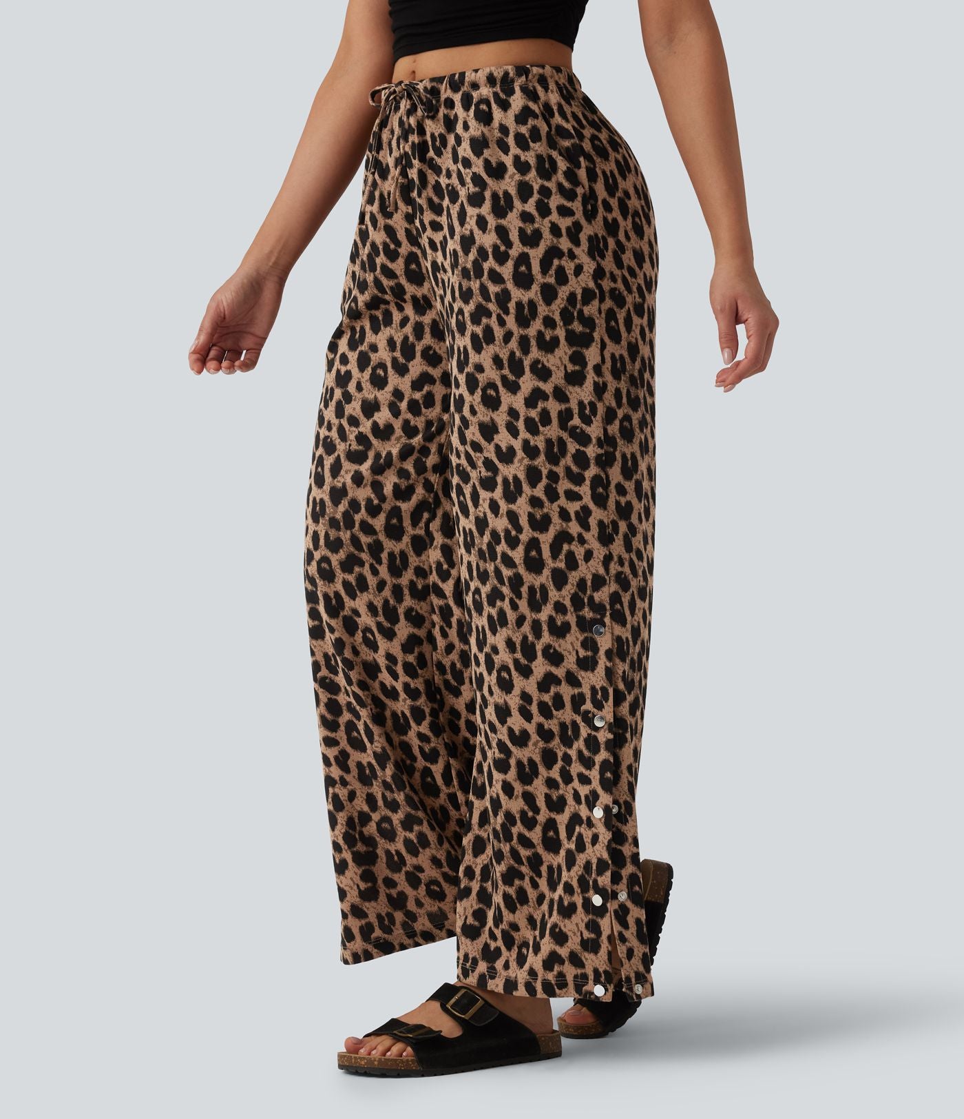 Pantalon large casual en maille gaufrée imprimé léopard taille mi-haute avec cordon de serrage et poches