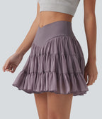 Jupe-short de tennis mini taille haute croisée fluide avec poches