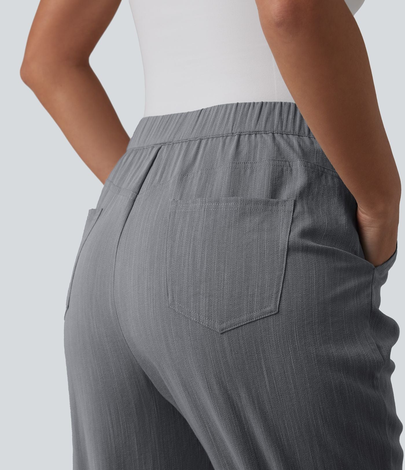 Pantalon tailleur aspect lin fuselé taille haute asymétrique avec poches