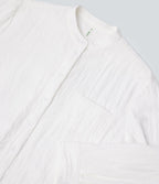 Chemise décontractée manches longues ourlet arrondi avec poche